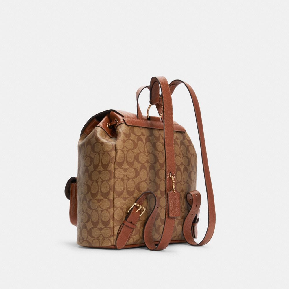 Coach Pennie Backpack In Signature Canvas - CL Posh Boutique