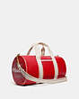 COACH®,DUFFLE,Smooth Leather,X-Large,Brass/Electric Red Chalk,Angle View