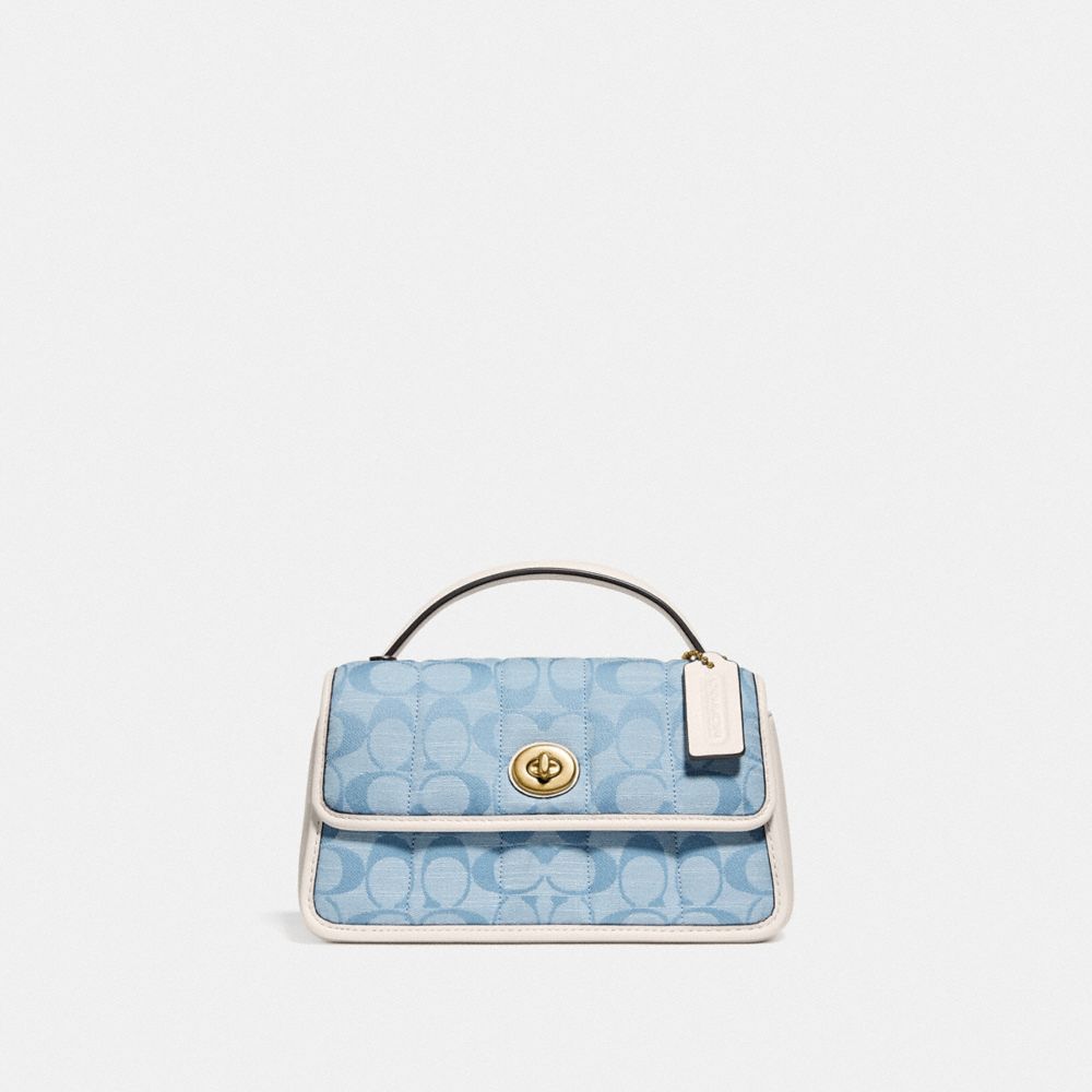 Coach turnlock clutch white sale