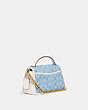 COACH®,TURNLOCK CLUTCH 20 IN SIGNATURE CHAMBRAY WITH QUILTING,Signature chambray,Small,Brass/Light Washed Denim Chalk,Angle View