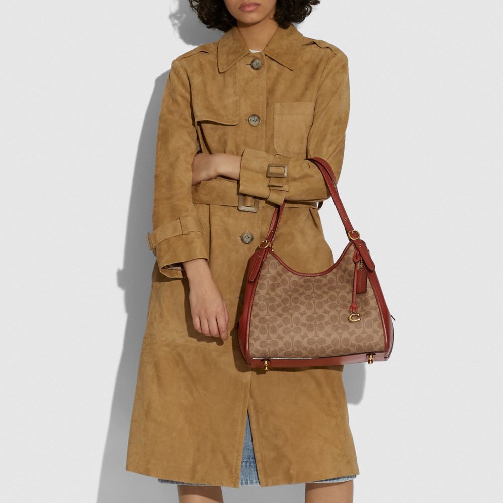 Shop Coach SIGNATURE 2023 Cruise Lori shoulder bag in signature canvas  (C4825) by resuscitation