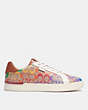COACH®,LOWLINE LOW TOP SNEAKER IN RAINBOW SIGNATURE CANVAS,Signature Coated Canvas/Leather,TAN MULTI,Angle View