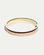 COACH®,SIGNATURE BANGLE,Enamel/Plated Brass,Gold/ Pink Multicolor,Front View