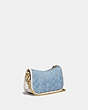 COACH®,SWINGER BAG 20 IN SIGNATURE CHAMBRAY WITH QUILTING,Signature chambray,Small,Brass/Light Washed Denim Chalk,Angle View