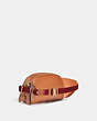 COACH®,HITCH BELT BAG IN RAINBOW SIGNATURE CANVAS,Signature Coated Canvas/Smooth Leather,Small,Brass/Saddle Multi,Angle View