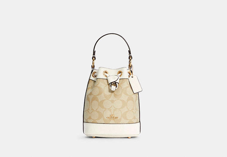 COACH®,DEMPSEY DRAWSTRING BUCKET BAG 15 IN SIGNATURE CANVAS,Signature Coated Canvas/Pebble Leather,Medium,Gold/Light Khaki Chalk,Front View