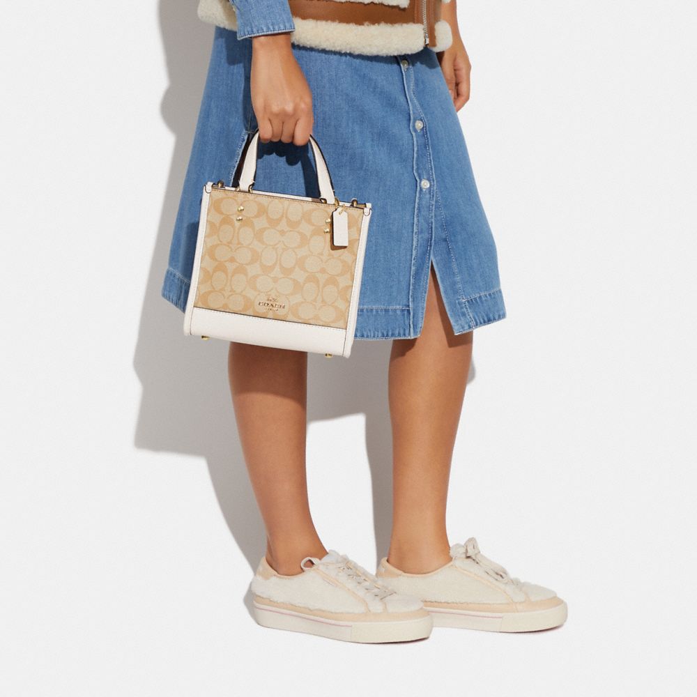 COACH® | Dempsey Tote 22 In Signature Canvas