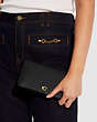 COACH®,SLIM WALLET,Calf Leather,Mini,Brass/Black,Detail View