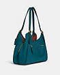 COACH®,LORI SHOULDER BAG,Pebble Leather/Suede,Large,Brass/Deep Turquoise Multi,Angle View