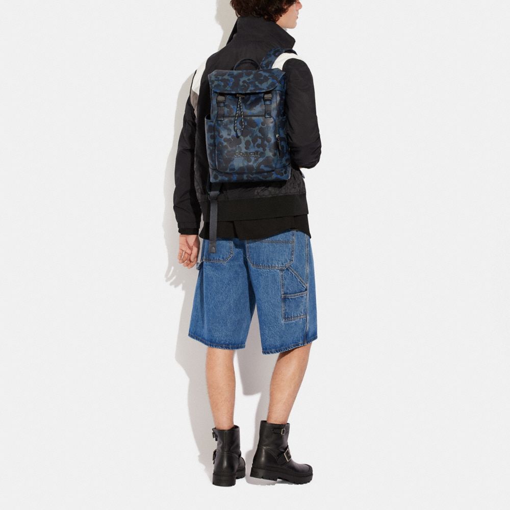 Coach blue shop camo backpack