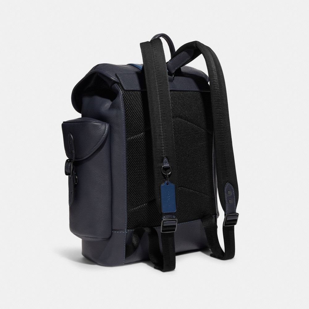 Black and best sale blue coach backpack