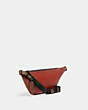 COACH®,LEAGUE BELT BAG IN COLORBLOCK,Refined Calf Leather,Medium,Black Copper/Oxblood,Angle View