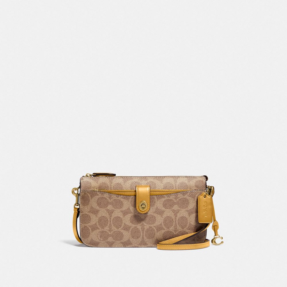 COACH® | Noa Pop Up Messenger In Signature Canvas