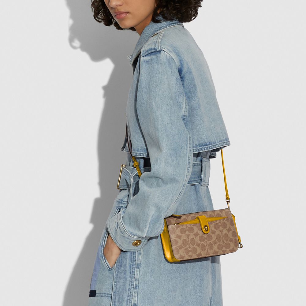 COACH: Noa shoulder bag in leather and coated canvas with logo