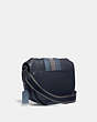 COACH®,HITCH CROSSBODY WITH VARSITY STRIPE,Pebble Leather/Smooth Leather/Suede,Medium,Black Copper/Midnight Navy Multi,Angle View