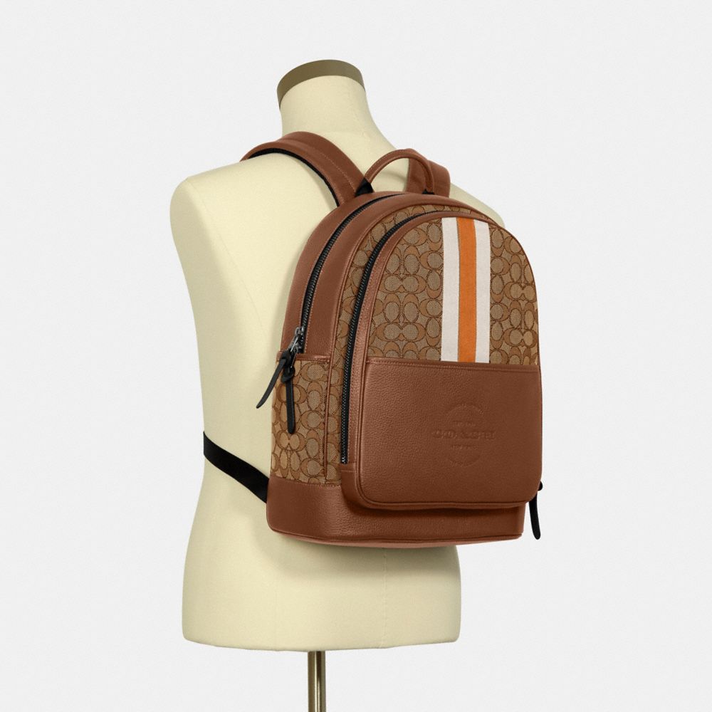 Coach - Small Tan Monogram Print Backpack – Current Boutique