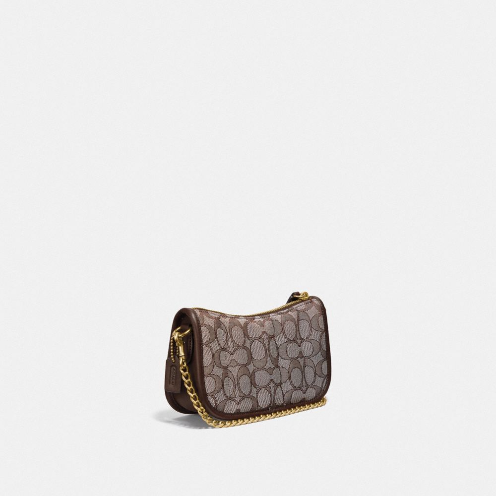 COACH®,Swinger Bag 20 In Signature Jacquard With Quilting,,Angle View