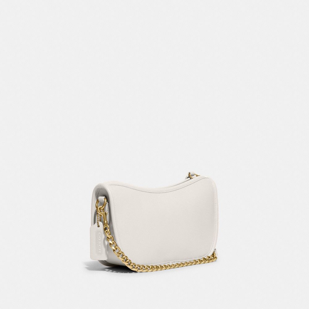 White and cheap gold coach purse