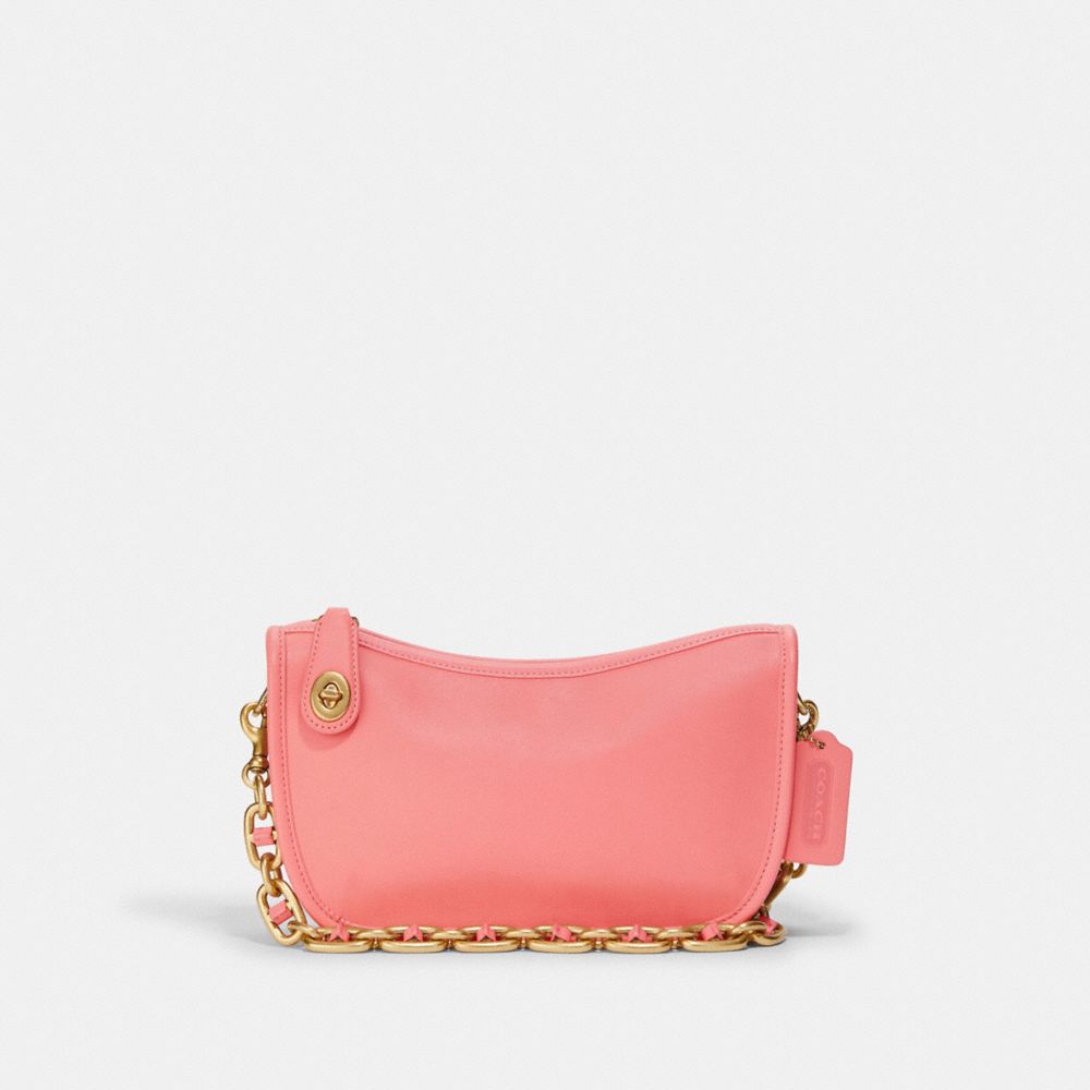 Leather shoulder bag with exterior details.Shoulder strap with chunky chain.Zip  closure