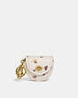 COACH®,MINI SADDLE BAG CHARM WITH PAINT DAB FLORAL PRINT,Smooth Leather,Mini,Brass/Chalk,Front View