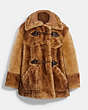 Coach X Schott NYC manteau oversize en peau lainée