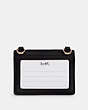 COACH®,FLAP CARD CASE ON LANYARD IN COLORBLOCK SIGNATURE CANVAS,Mini,Gold/Khaki Black Multi,Back View