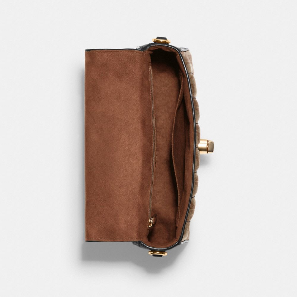 Satchel à poignée supérieure Marlie en toile signature avec matelassage