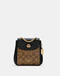 COACH®,CONVERTIBLE MINI BACKPACK IN SIGNATURE CANVAS,Signature Coated Canvas/Pebble Leather,Medium,Gold/Khaki/Black,Front View