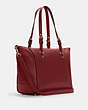 COACH®,KLEO CARRYALL,Pebbled Leather,X-Large,Gold/Cherry,Angle View