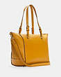 COACH®,KLEO CARRYALL,Pebbled Leather,X-Large,Gold/Flax,Angle View