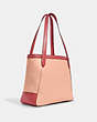 COACH®,TOTE 27 IN COLORBLOCK WITH HORSE AND CARRIAGE,Pebble Leather,Medium,Gold/Faded Blush Multi,Angle View