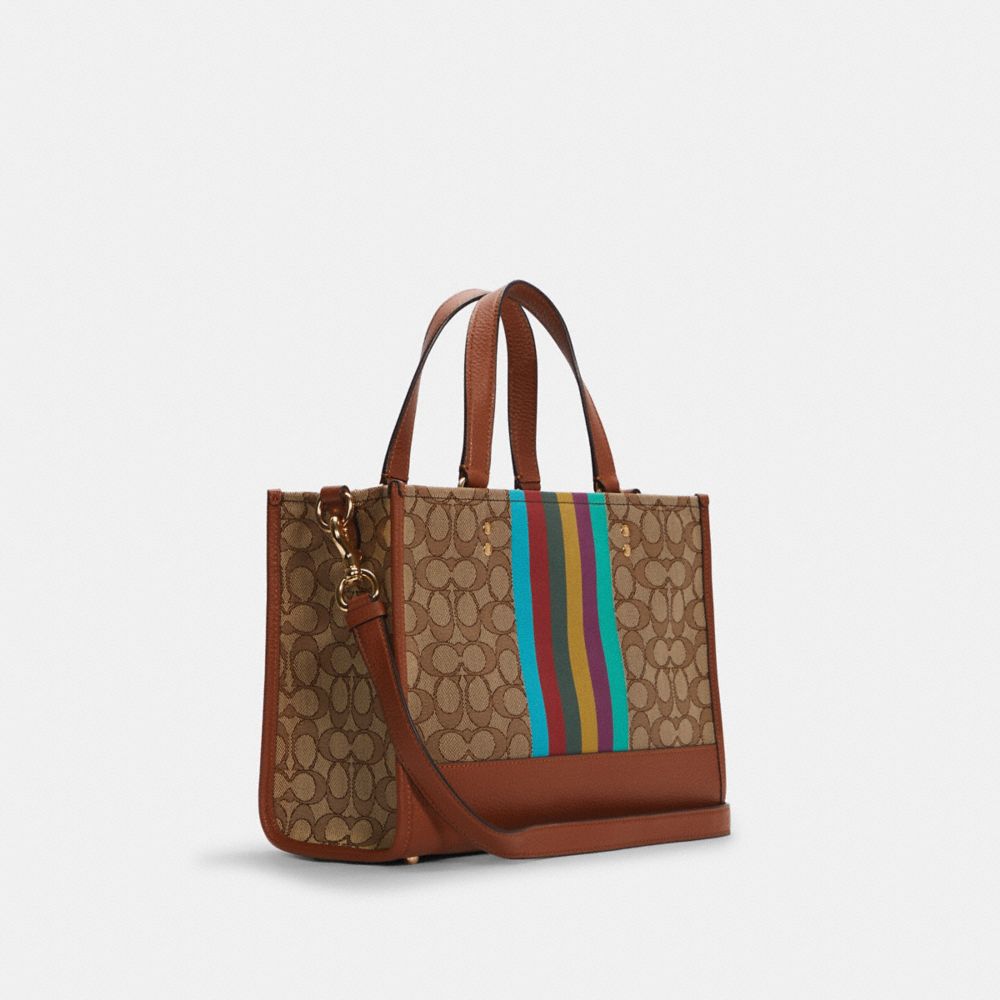 Coach dempsey carryall with banana leaves print hot sale