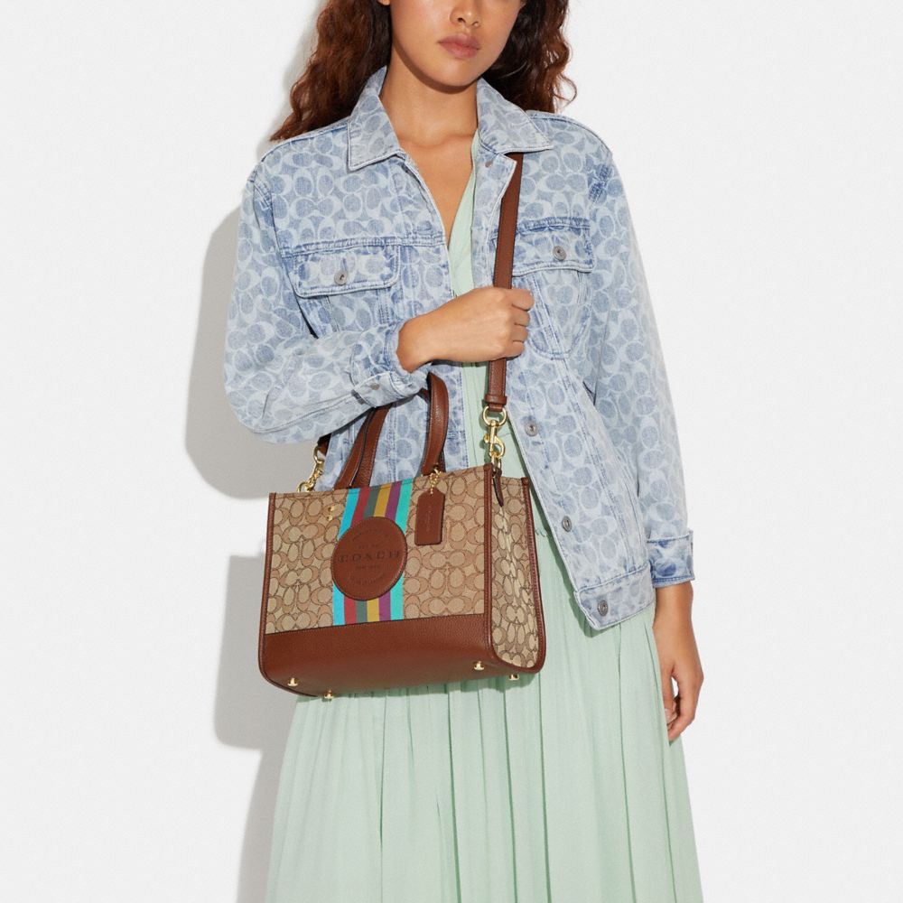 COACH®,Dempsey Carryall Bag In Signature Jacquard With Stripe And Coach Patch,,Detail View