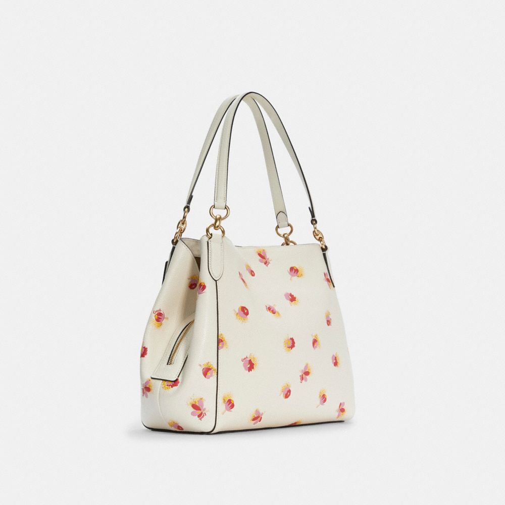 Coach sling bag discount floral