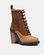 COACH®,HAVEN BOOT,Raw Umber/ Natural,Front View