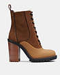 COACH®,HAVEN BOOT,Raw Umber/ Natural,Angle View