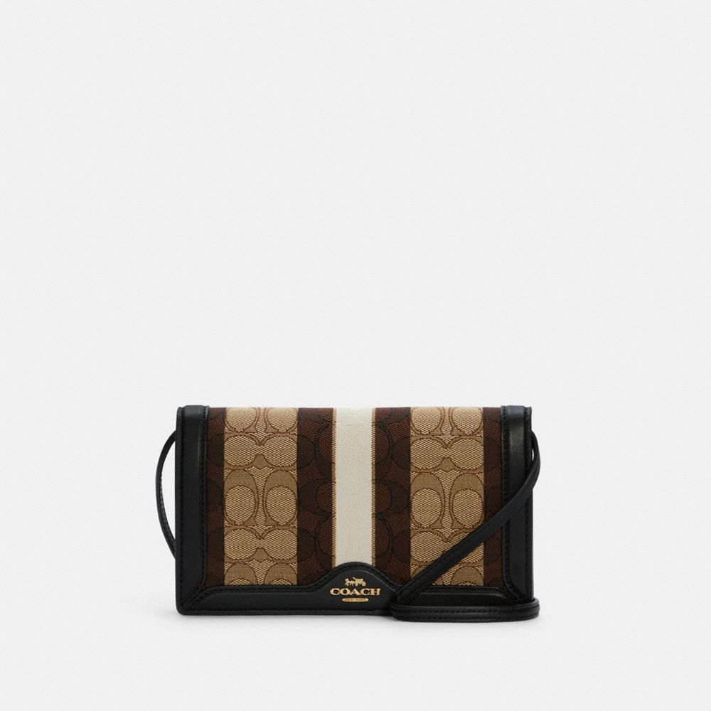 COACH Anna Foldover Crossbody Bag Clutch In Signature Canvas in Black