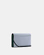 COACH®,ANNA FOLDOVER CLUTCH CROSSBODY IN COLORBLOCK WITH HORSE AND CARRIAGE,Leather,Gold/Twilight Multi,Angle View