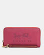 COACH®,LONG ZIP AROUND WALLET IN COLORBLOCK WITH HORSE AND CARRIAGE,Leather,Mini,Gold/Bright Violet Multi,Front View