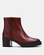 COACH®,CHRISSY BOOTIE,Leather,Red Mocha,Angle View