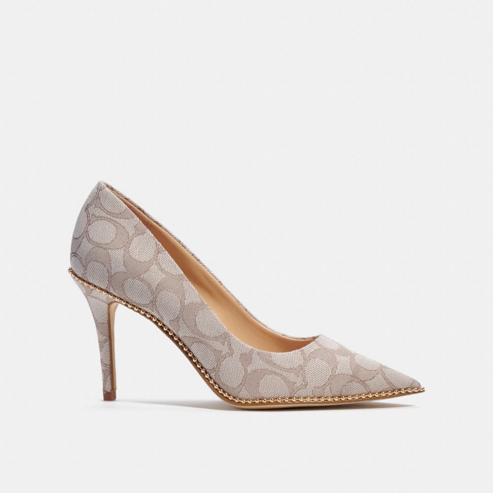 Coach discount snakeskin pumps