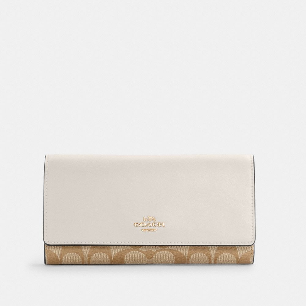 Slim Trifold Wallet In Signature Canvas - COACH® Outlet