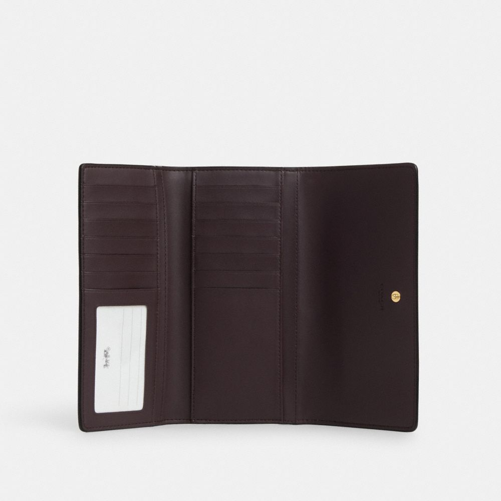COACH® Outlet | Slim Trifold Wallet In Signature Canvas