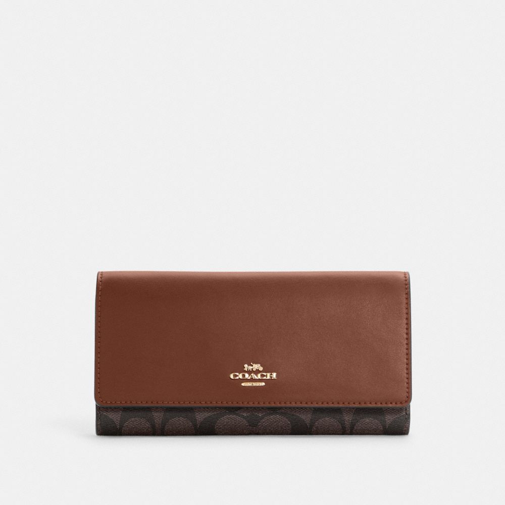 COACH® Outlet | Slim Trifold Wallet In Signature Canvas