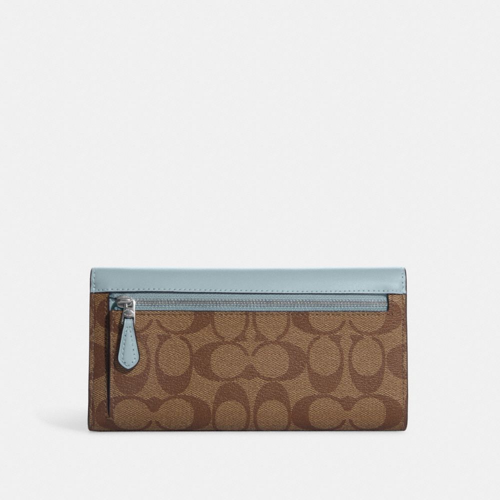 COACH® Outlet  Slim Trifold Wallet In Signature Canvas