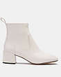 COACH®,NALA BOOTIE,mixedmaterial,Chalk,Angle View