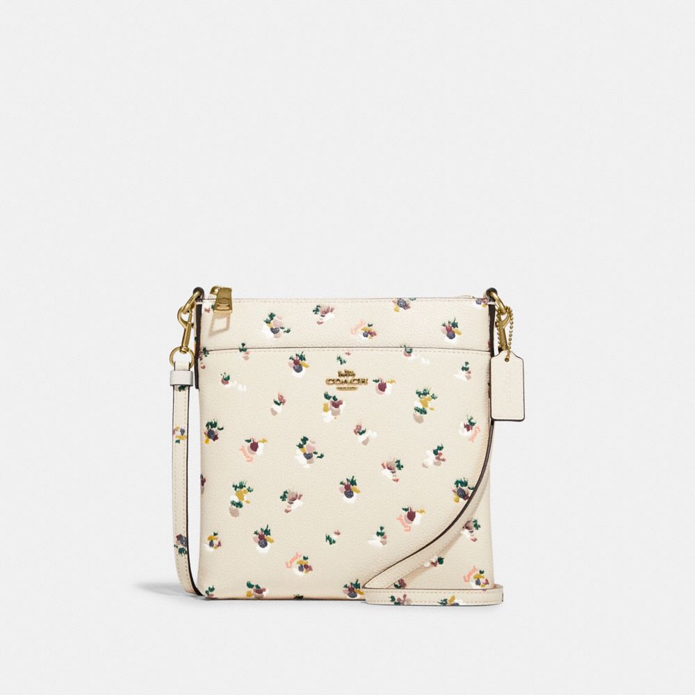 Kitt messenger crossbody on sale with rose print