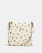 COACH®,KITT MESSENGER CROSSBODY BAG WITH PAINT DAB FLORAL PRINT,Pebble Leather,Small,Brass/Chalk Multi,Front View