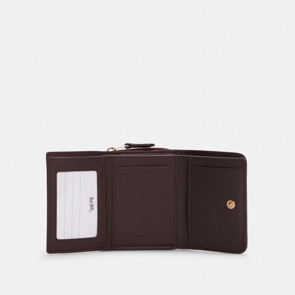 Petit portefeuille à trois volets en colorblock