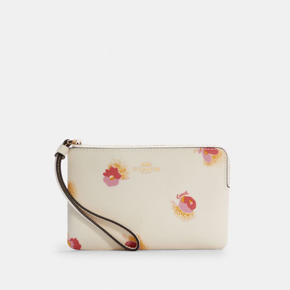 Wristlet à zip en coin avec imprimé floral Pop